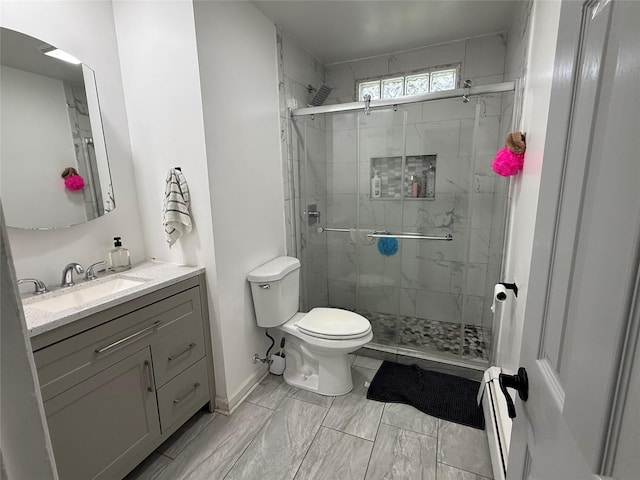 77 Upper Rd, Bloomingburg, NY 10940 - full bathroom featuring toilet, a stall shower, vanity, marble look tiles, and baseboards