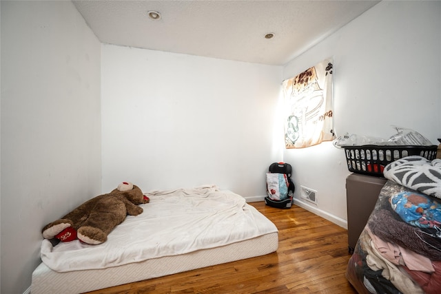 929 Fox Meadow Rd, Yorktown Heights, NY 10598 - bedroom featuring wood finished floors and baseboards