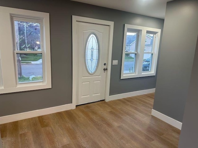123 Mitchell St, North Bellmore, NY 11710 - entrance foyer featuring baseboards and wood finished floors