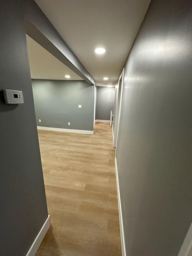 123 Mitchell St, North Bellmore, NY 11710 - corridor with baseboards, light wood-style flooring, and recessed lighting