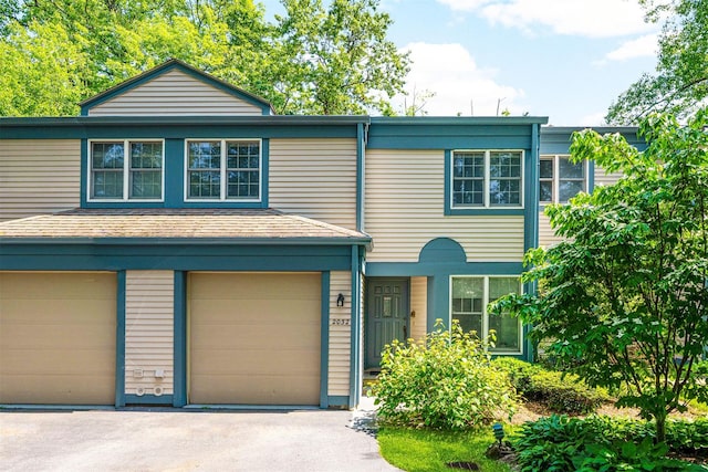 2032 Palmer Ave, Larchmont, NY 10538 - view of front of home with an attached garage and asphalt driveway