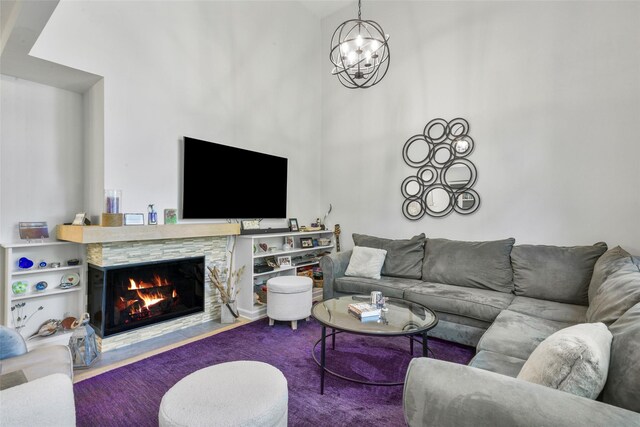2032 Palmer Ave, Larchmont, NY 10538 - living area featuring a fireplace with flush hearth and a chandelier