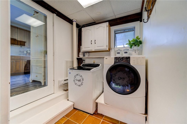 88 Prices Switch Rd, Warwick, NY 10990 - laundry room with cabinet space, washing machine and dryer, and light tile patterned floors