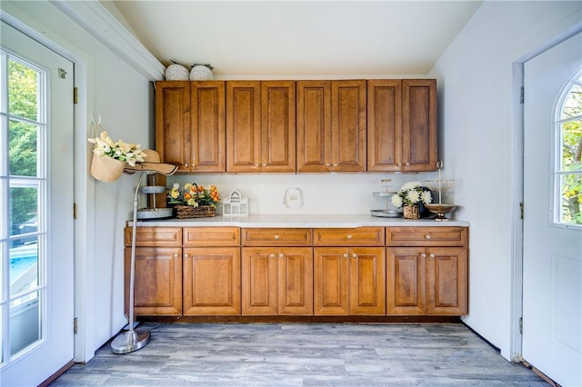 88 Prices Switch Rd, Warwick, NY 10990 - kitchen with brown cabinets, light countertops, and light wood finished floors
