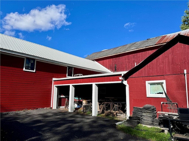 88 Prices Switch Rd, Warwick, NY 10990 - view of property exterior featuring a pole building, metal roof, and an outbuilding