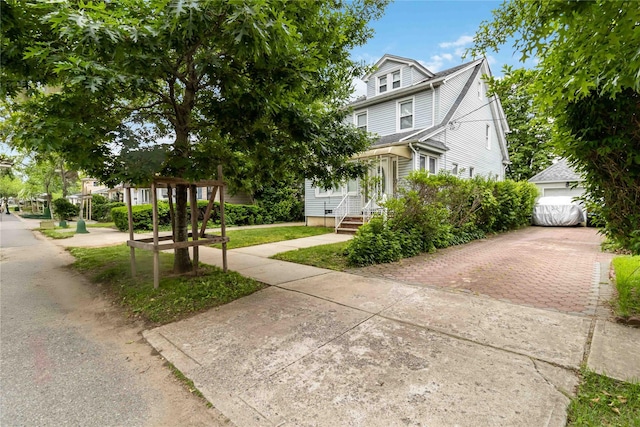 114-18 175th St, Addisleigh Park, NY 11434 - view of front facade featuring decorative driveway