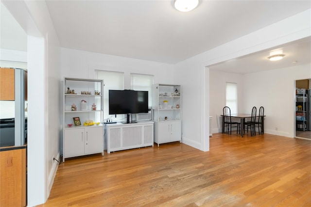 114-18 175th St, Addisleigh Park, NY 11434 - living area with light wood-style floors and baseboards