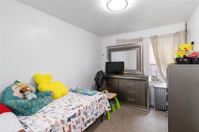 114-18 175th St, Addisleigh Park, NY 11434 - bedroom featuring radiator and carpet