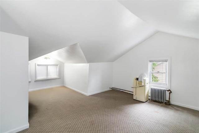 114-18 175th St, Addisleigh Park, NY 11434 - additional living space featuring radiator, lofted ceiling, carpet floors, baseboard heating, and baseboards