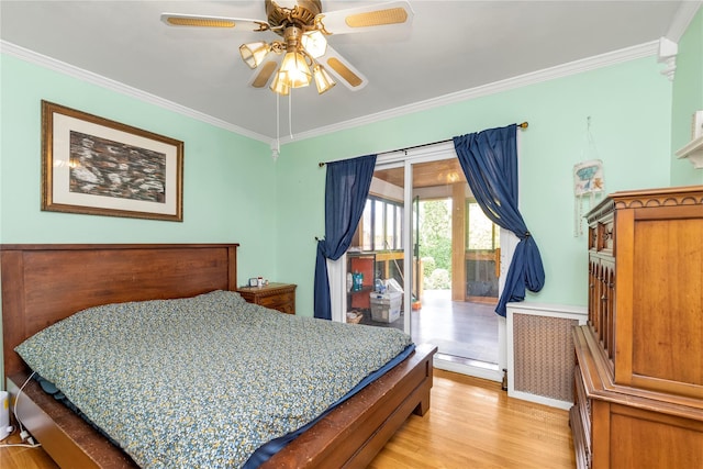 590 Langley Ave, West Hempstead, NY 11552 - bedroom with ornamental molding, access to exterior, light wood-style flooring, and a ceiling fan