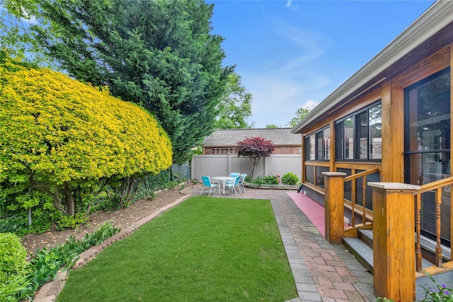 590 Langley Ave, West Hempstead, NY 11552 - view of yard with a patio area