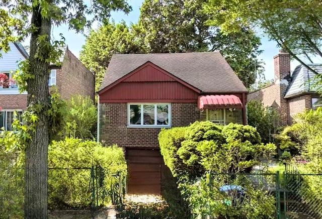 85-82 66th Rd, Rego Park, NY 11374 - view of front of house featuring brick siding and a shingled roof