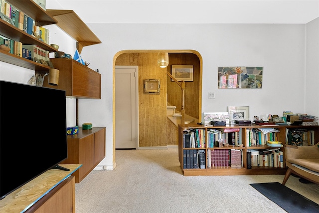 85-82 66th Rd, Rego Park, NY 11374 - sitting room with arched walkways, light colored carpet, stairs, and baseboards