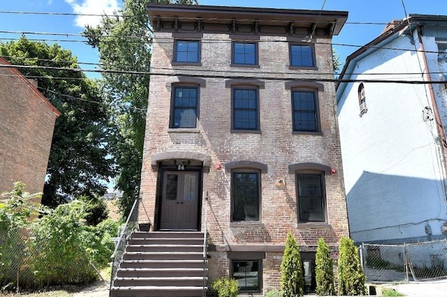 86 Lander St, Newburgh, NY 12550 - italianate home featuring brick siding
