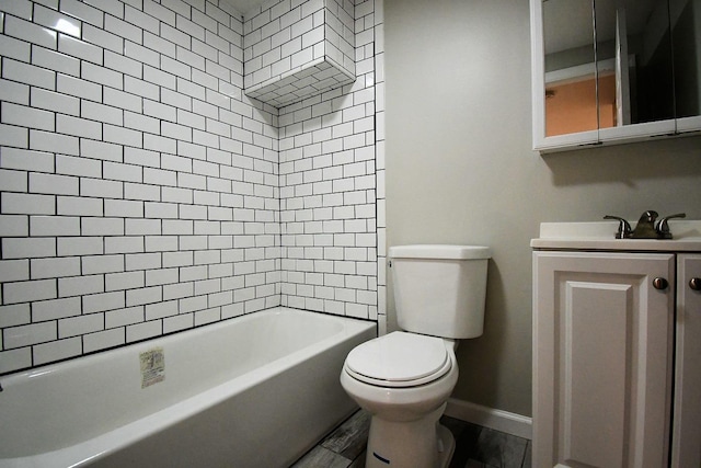 86 Lander St, Newburgh, NY 12550 - bathroom featuring toilet, vanity, bathing tub / shower combination, and baseboards