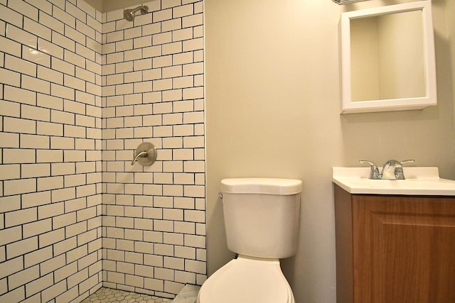 86 Lander St, Newburgh, NY 12550 - bathroom featuring toilet, vanity, and a stall shower