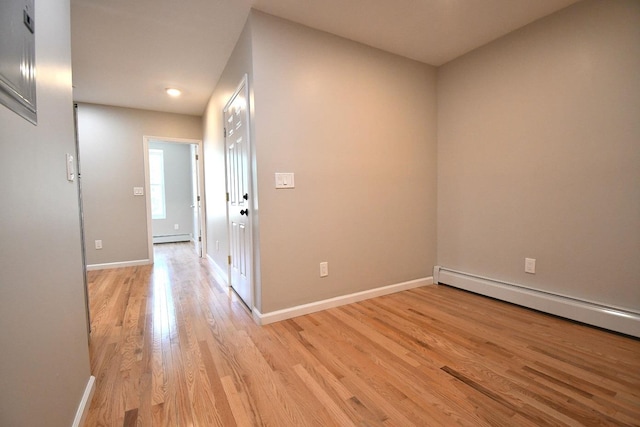 86 Lander St, Newburgh, NY 12550 - hall featuring light wood-style floors, baseboards, and baseboard heating