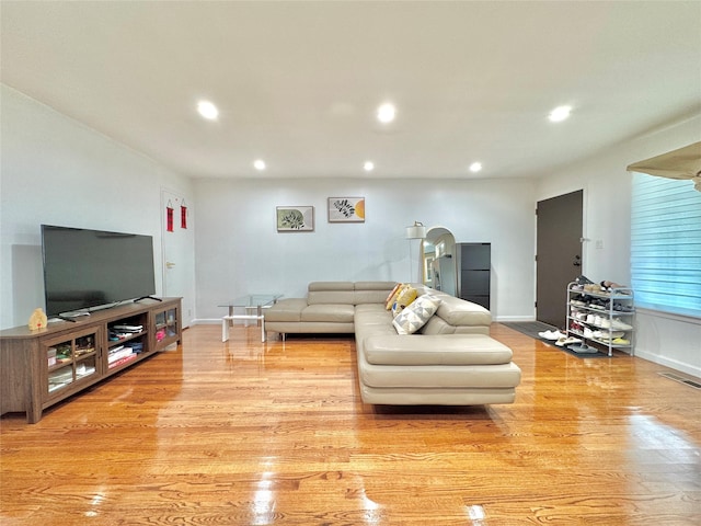 20426 45th Dr, Bayside, NY 11361 - living room with light wood finished floors, recessed lighting, and baseboards