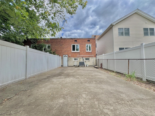 20426 45th Dr, Bayside, NY 11361 - back of house featuring brick siding