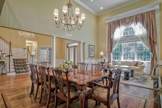 21 Hathaway Ln, Manhasset, NY 11030 - dining room with a chandelier, a high ceiling, stairway, crown molding, and wainscoting