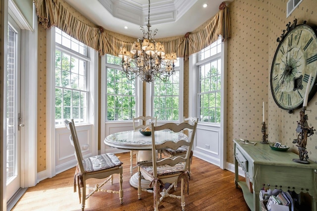 21 Hathaway Ln, Manhasset, NY 11030 - dining area featuring ornamental molding, a chandelier, wood finished floors, plenty of natural light, and recessed lighting