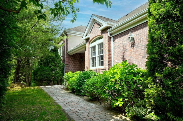 21 Hathaway Ln, Manhasset, NY 11030 - view of property exterior with brick siding