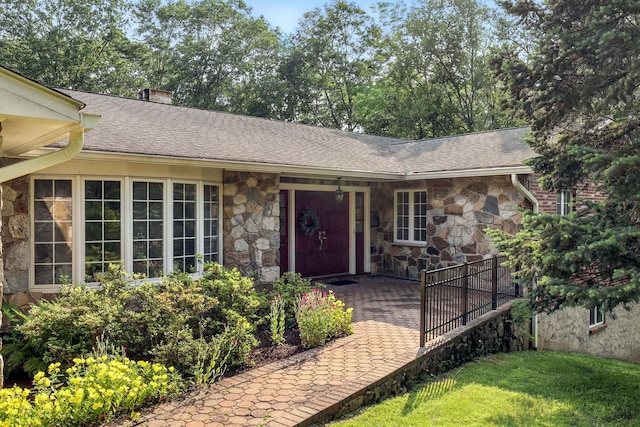 3 David Rd, Somers, NY 10589 - view of front of house with stone siding, a shingled roof, and a front lawn