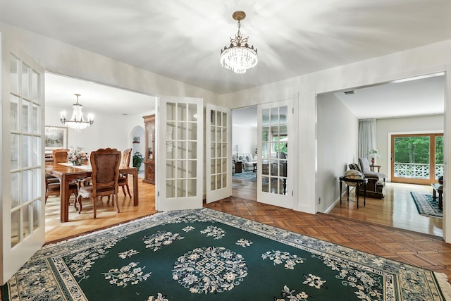 3 David Rd, Somers, NY 10589 - dining space with french doors and a chandelier