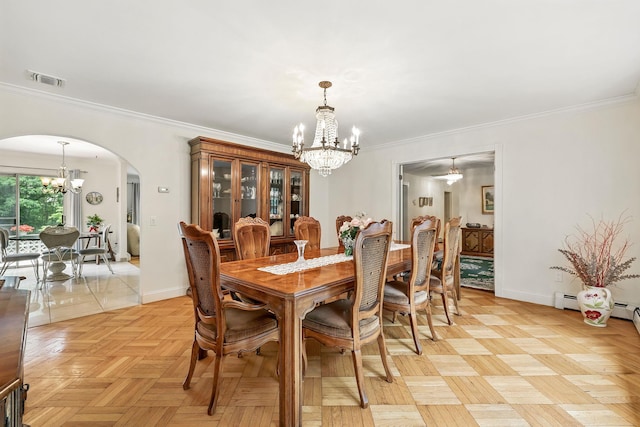 3 David Rd, Somers, NY 10589 - dining area with a chandelier, arched walkways, and ornamental molding