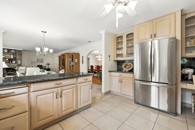3 David Rd, Somers, NY 10589 - kitchen featuring freestanding refrigerator, arched walkways, a chandelier, light brown cabinetry, and ornamental molding