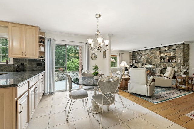 3 David Rd, Somers, NY 10589 - dining area featuring light tile patterned floors, a chandelier, and crown molding