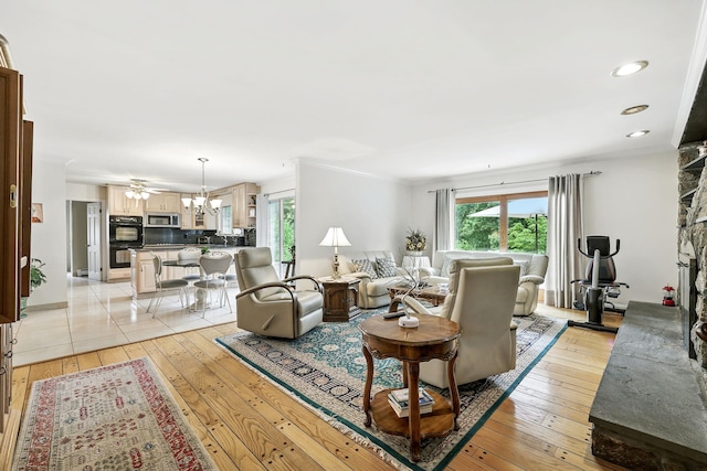 3 David Rd, Somers, NY 10589 - living area with healthy amount of natural light, a chandelier, light wood finished floors, and recessed lighting