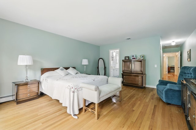 3 David Rd, Somers, NY 10589 - bedroom featuring attic access, light wood-type flooring, and a baseboard heating unit