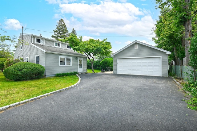 2 Anvil Ln, Levittown, NY 11756 - view of front of home with a garage and an outdoor structure