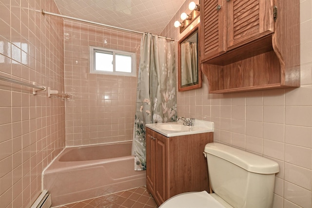 2 Anvil Ln, Levittown, NY 11756 - full bath featuring tile walls, shower / tub combo with curtain, a baseboard heating unit, toilet, and vanity