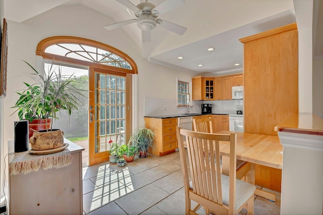 43 Sound Rd, Greenport, NY 11944 - dining space with light tile patterned flooring, ceiling fan, recessed lighting, and lofted ceiling