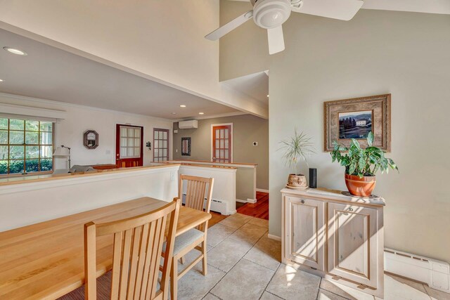 43 Sound Rd, Greenport, NY 11944 - dining area with a wall mounted AC, crown molding, light tile patterned floors, ceiling fan, and recessed lighting
