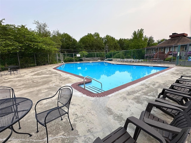 340 Concord Ln, Middletown, NY 10940 - community pool with a patio area and view of scattered trees