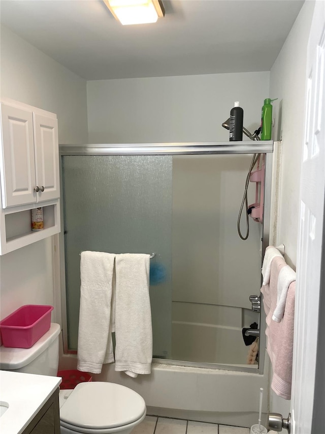 340 Concord Ln, Middletown, NY 10940 - bathroom featuring vanity, toilet, combined bath / shower with glass door, and tile patterned floors