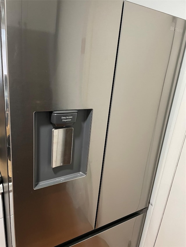 340 Concord Ln, Middletown, NY 10940 - detailed view of stainless steel fridge with ice dispenser
