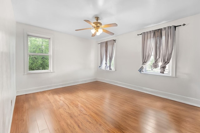 11401 115th St, South Ozone Park, NY 11420 - unfurnished room featuring light wood-type flooring, ceiling fan, and baseboards