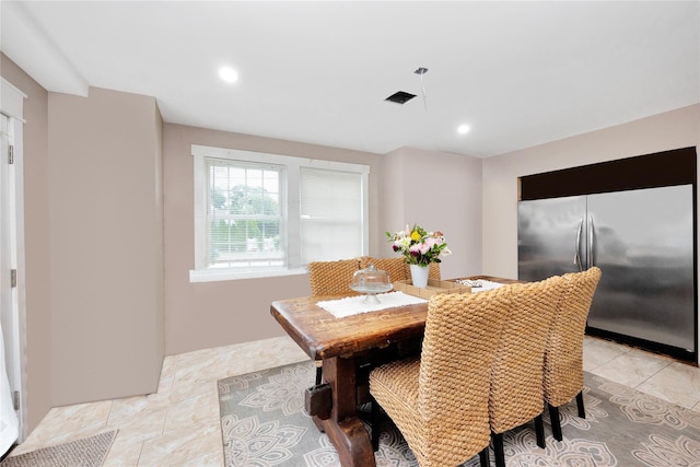 1582 Little Neck Ave, North Bellmore, NY 11710 - dining room featuring light tile patterned floors and recessed lighting