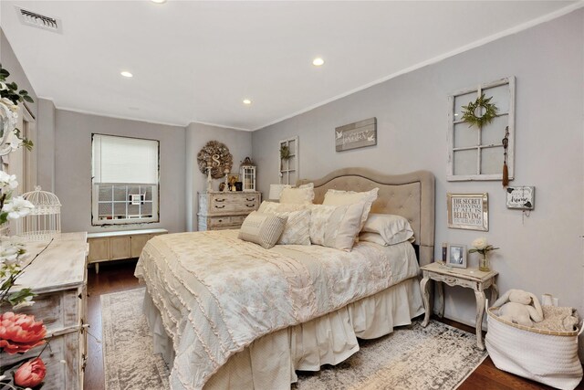1582 Little Neck Ave, North Bellmore, NY 11710 - bedroom featuring dark wood-type flooring, crown molding, and recessed lighting