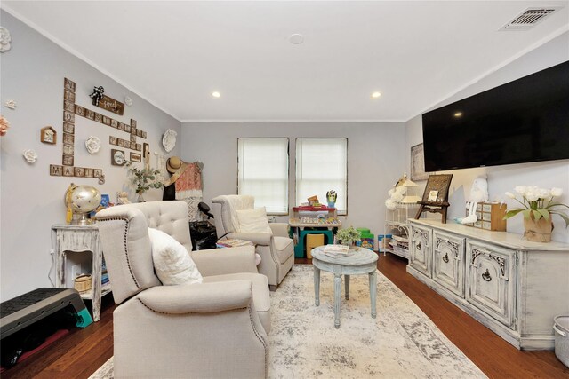 1582 Little Neck Ave, North Bellmore, NY 11710 - living room featuring ornamental molding, dark wood-type flooring, and recessed lighting