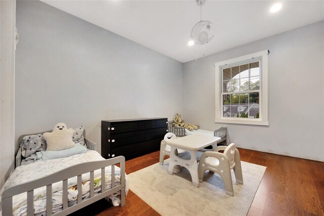 1582 Little Neck Ave, North Bellmore, NY 11710 - bedroom with wood finished floors and recessed lighting