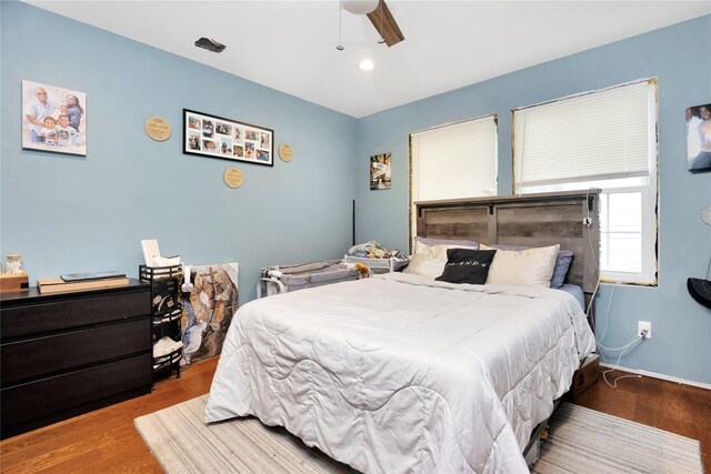 1582 Little Neck Ave, North Bellmore, NY 11710 - bedroom featuring wood finished floors, a ceiling fan, and recessed lighting