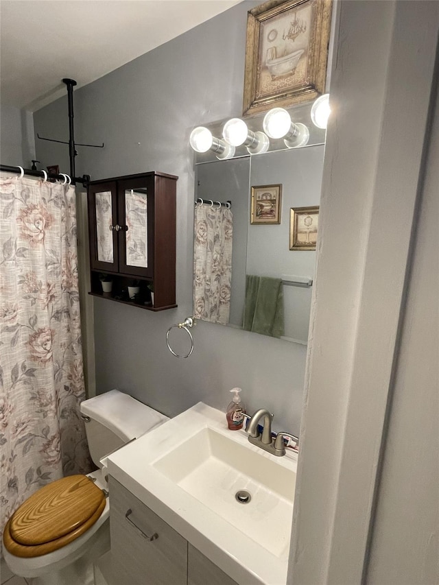268 Concord Ln, Middletown, NY 10940 - full bath featuring toilet, vanity, and a shower with shower curtain