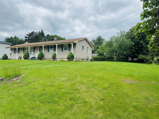 8 Hom St, Chester, NY 10918 - ranch-style home with covered porch, a front yard, and a chimney