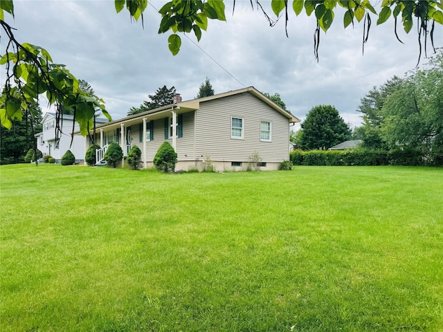 8 Hom St, Chester, NY 10918 - view of property exterior featuring a yard and a chimney