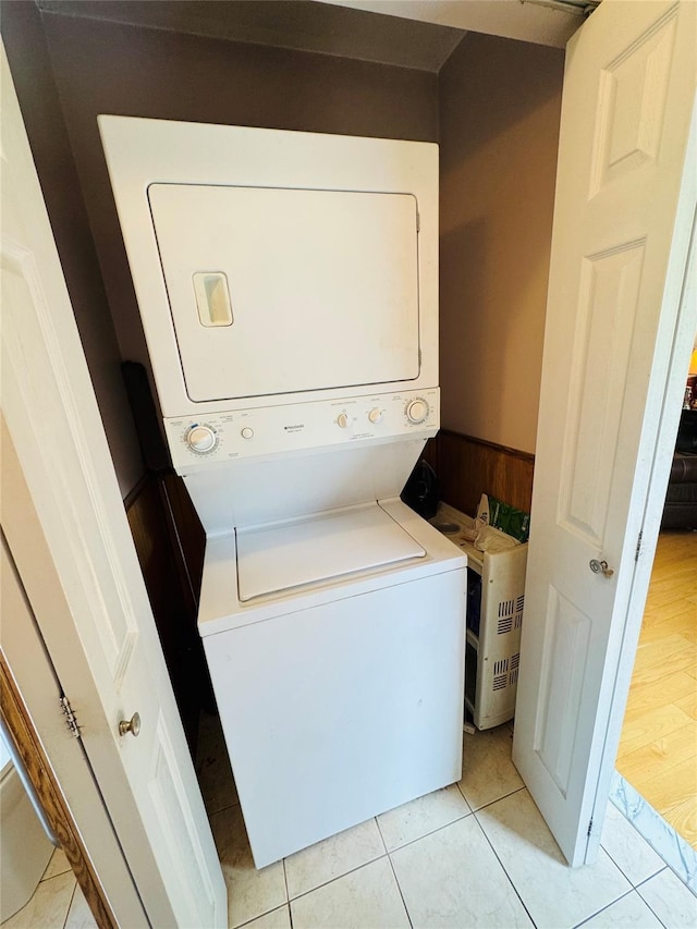 8 Hom St, Chester, NY 10918 - washroom featuring stacked washer / drying machine and light tile patterned floors